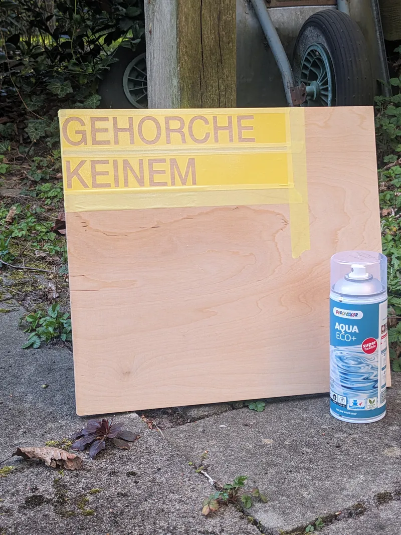 The stencil after spraying clear coat.